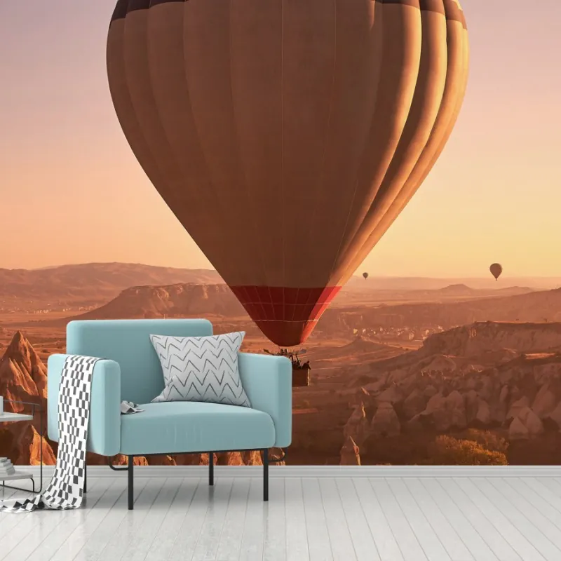Wall mural Cappadocia sunrise balloon over rock formations