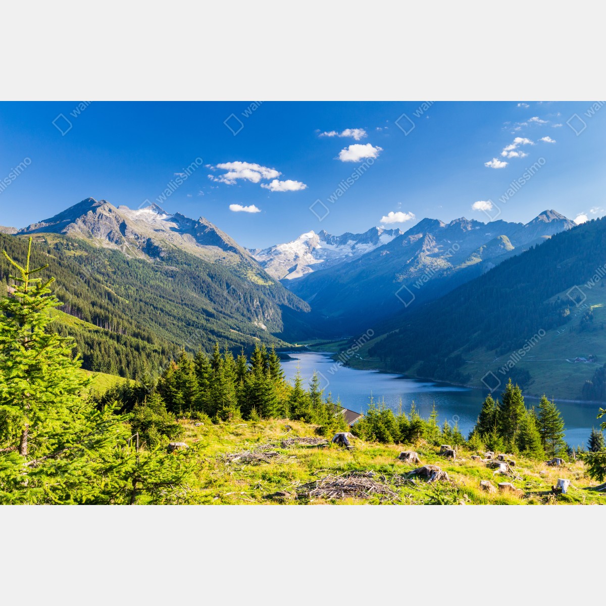 Leinwandbild ruhiges tal mit alpensee – Wallnifity® Leinwandbild ruhiges tal mit alpensee – Wallnifity®