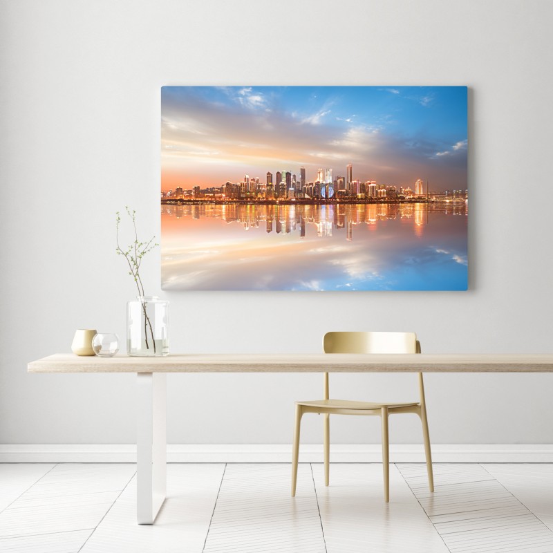 Leinwandbild stadtsilhouette im spiegelbild bei dämmerung – Wallnifity® Leinwandbild stadtsilhouette im spiegelbild bei dämmerung – Wallnifity®