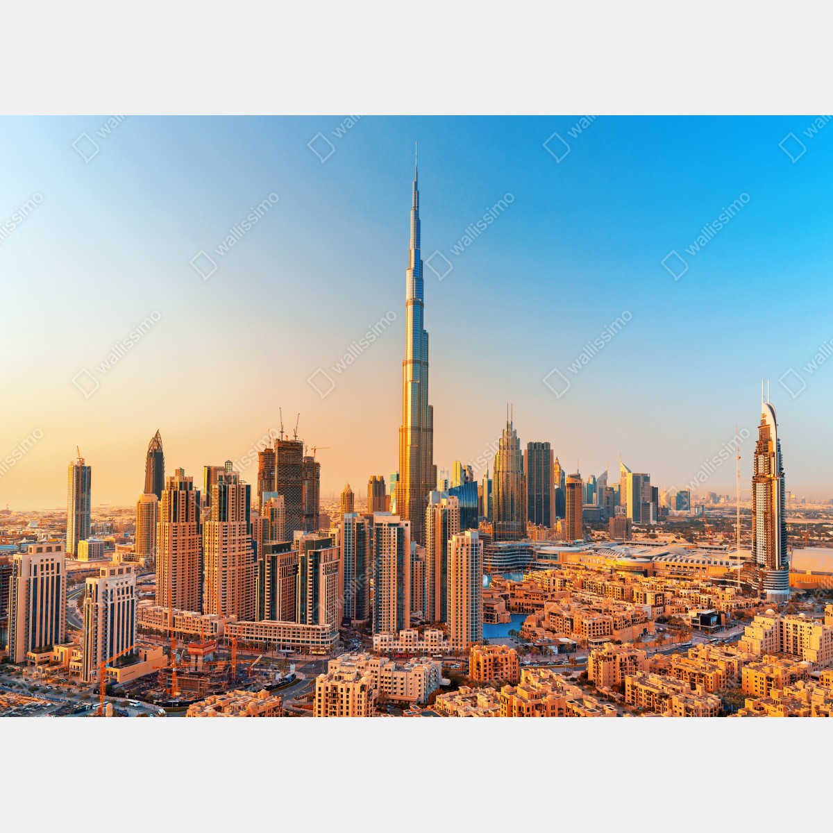 Leinwandbild Dubai skyline in der goldenen stunde – Wallnifity® Leinwandbild Dubai skyline in der goldenen stunde – Wallnifity®