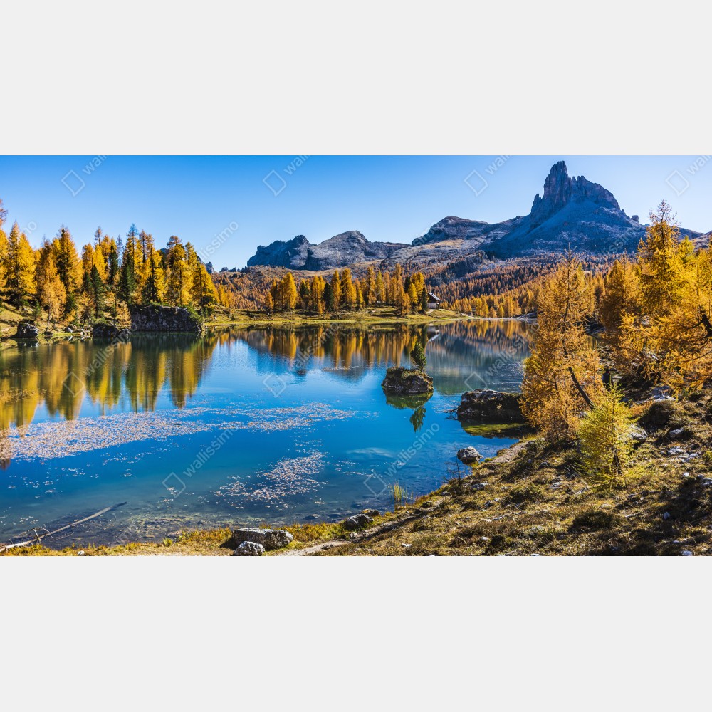 Leinwandbild herbstlicher alpensee mit bergreflexion – Wallnifity® Leinwandbild herbstlicher alpensee mit bergreflexion – Wallnifity®